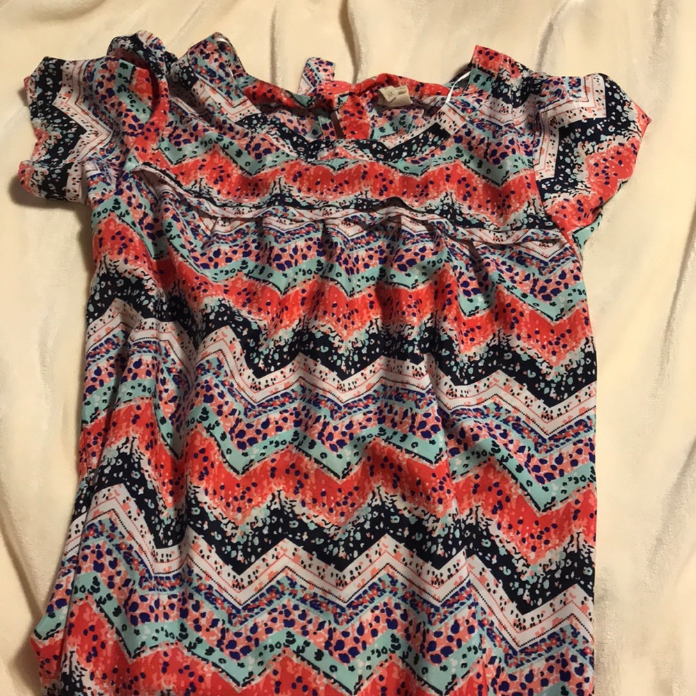 Bright colored blouse